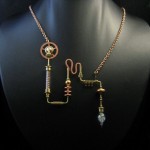 A necklace shaped like cogwheels and a crystal