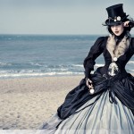Woman wearing a steampunk fashion dress and a hat