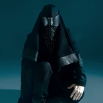A person wearing a futuristic combat suit