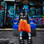 Andrea Arice, Stable Diffusion art, digital fashion, orange skirt and black puffer jacket,