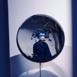blue haircut Ai character AI prediction bot, asian woman, mirror