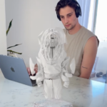digital designer looking at AR fashion outfit